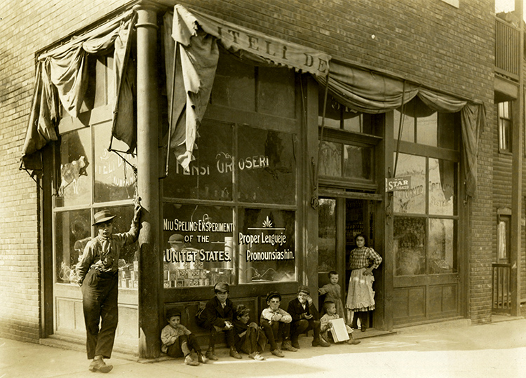 Children outside the Aleshi grocery store at 312 Holmes Street, 1909.