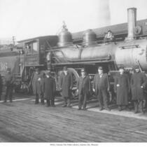 Railroad Workers and Engine